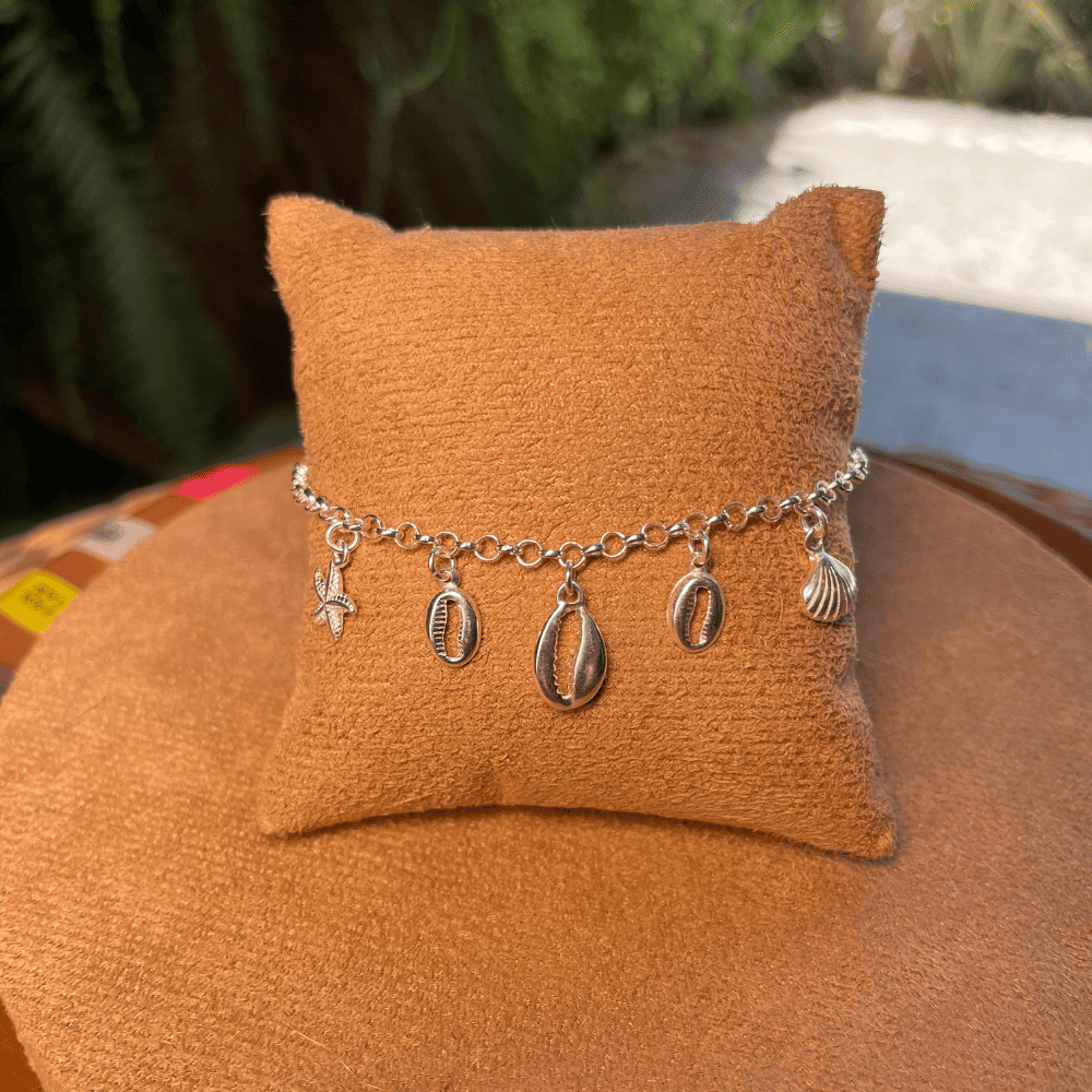 PULSEIRA DE ELOS LUZA COM BÚZIOS, ESTRELA DO MAR E CONCHA EM PRATA 925