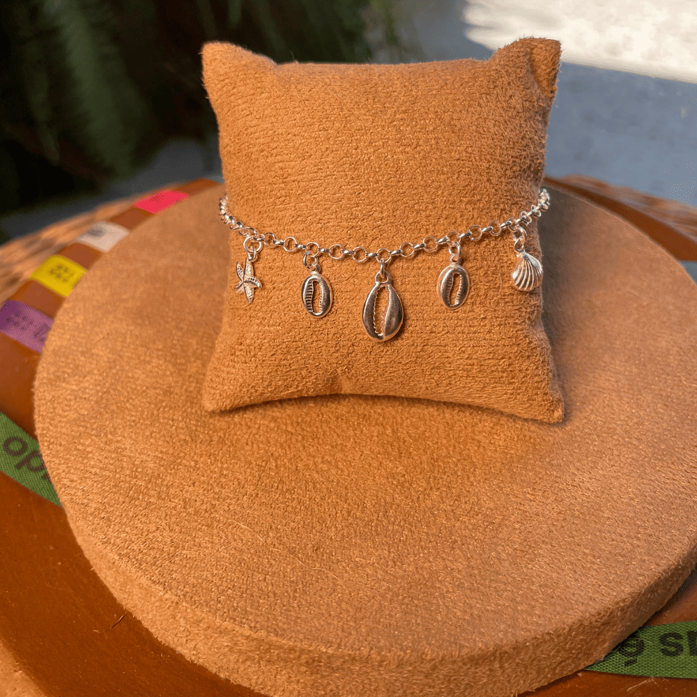 PULSEIRA DE ELOS LUZA COM BÚZIOS, ESTRELA DO MAR E CONCHA EM PRATA 925