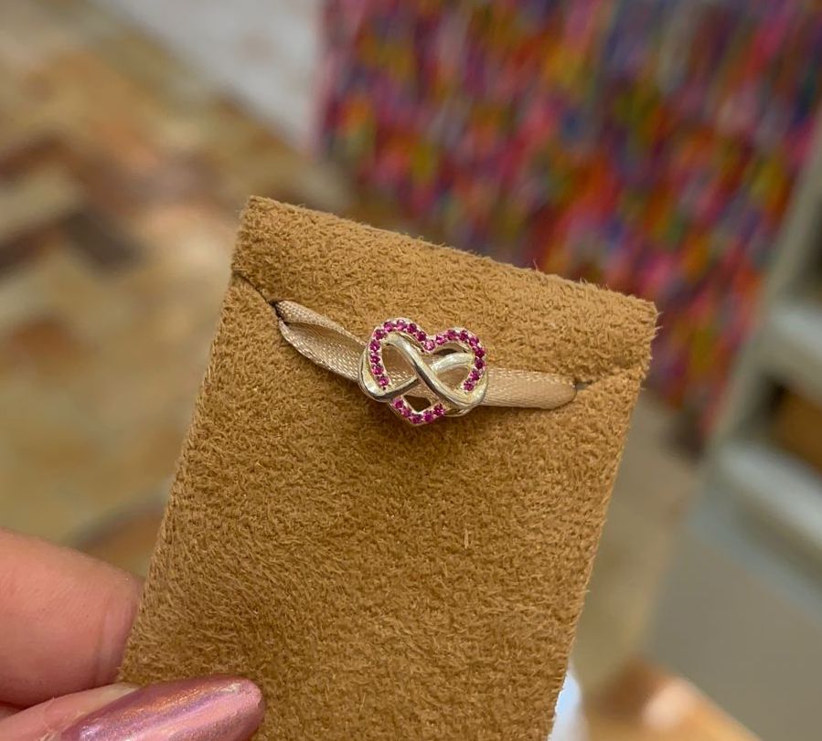 Berloque Passante Luza de Coração com Borda Cravejada em Rosa e Infinito Liso