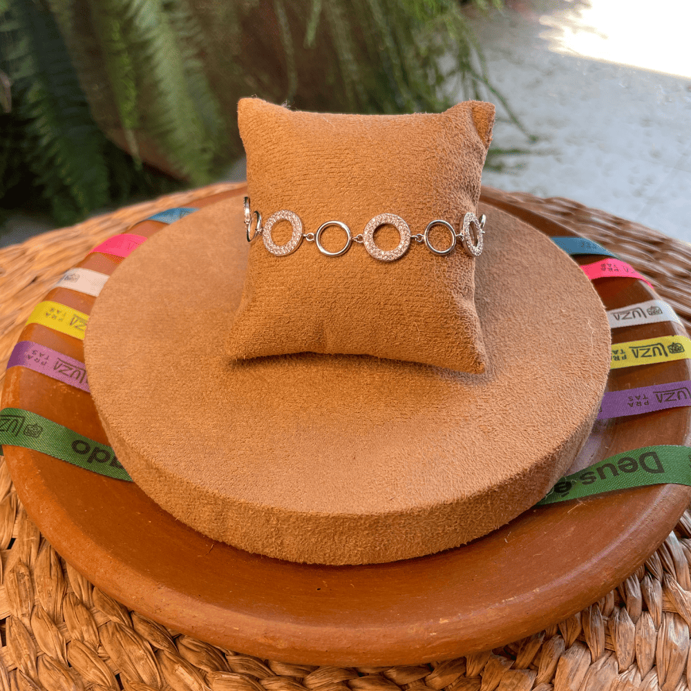 Pulseira de Círculos Vazados Luza com Detalhes Lisos e Cravejados de Zircônia em Prata 925