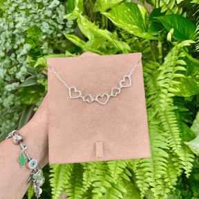 Pulseira com 5 Corações Vazado e Lisos em Prata 925